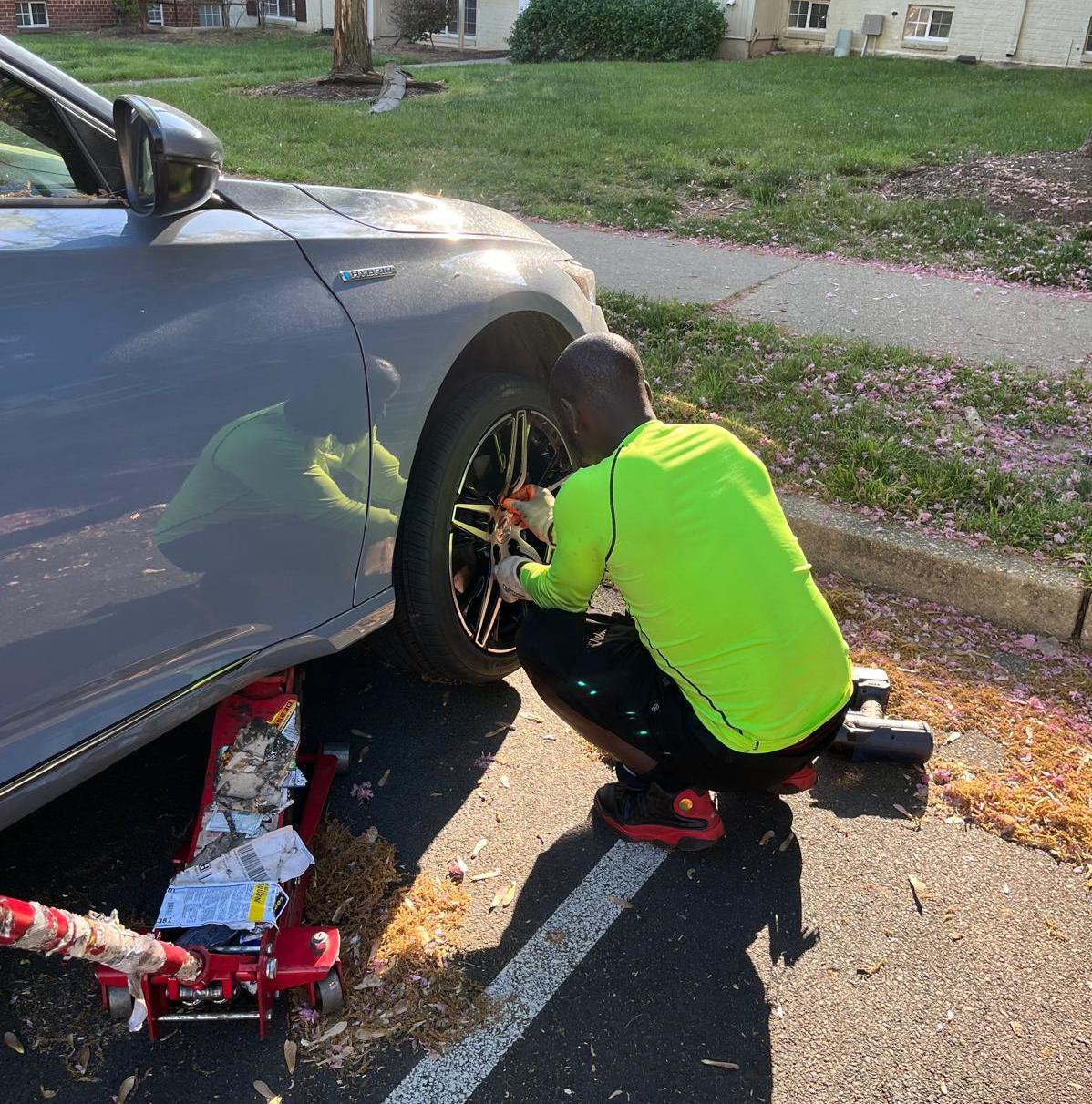 a delivery guy in front of a van